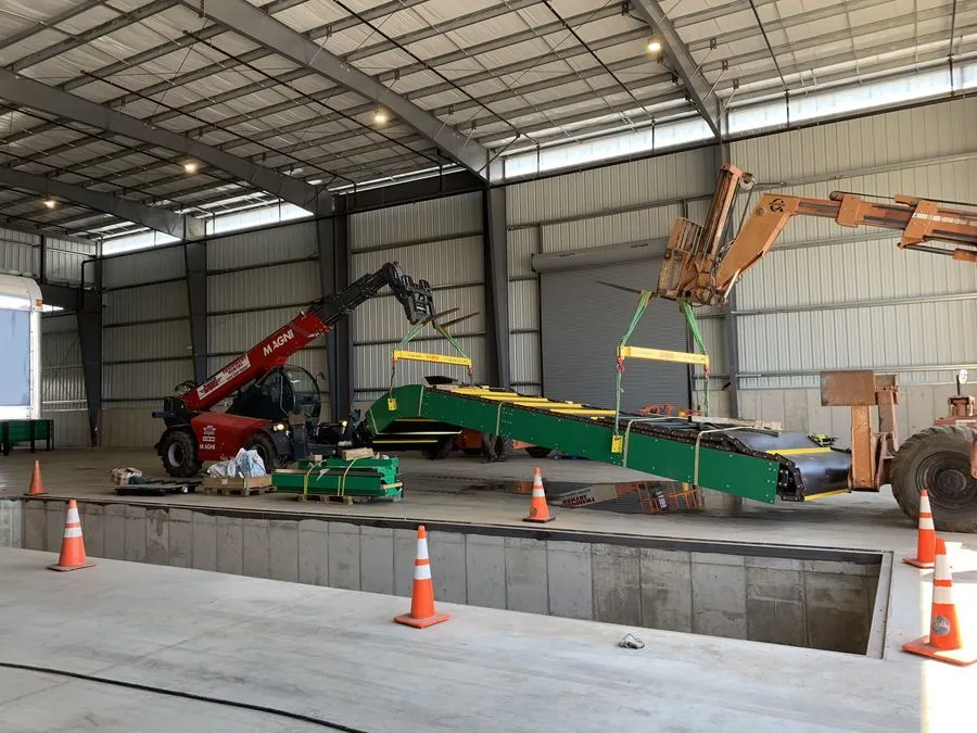 Crew installing new structural framing